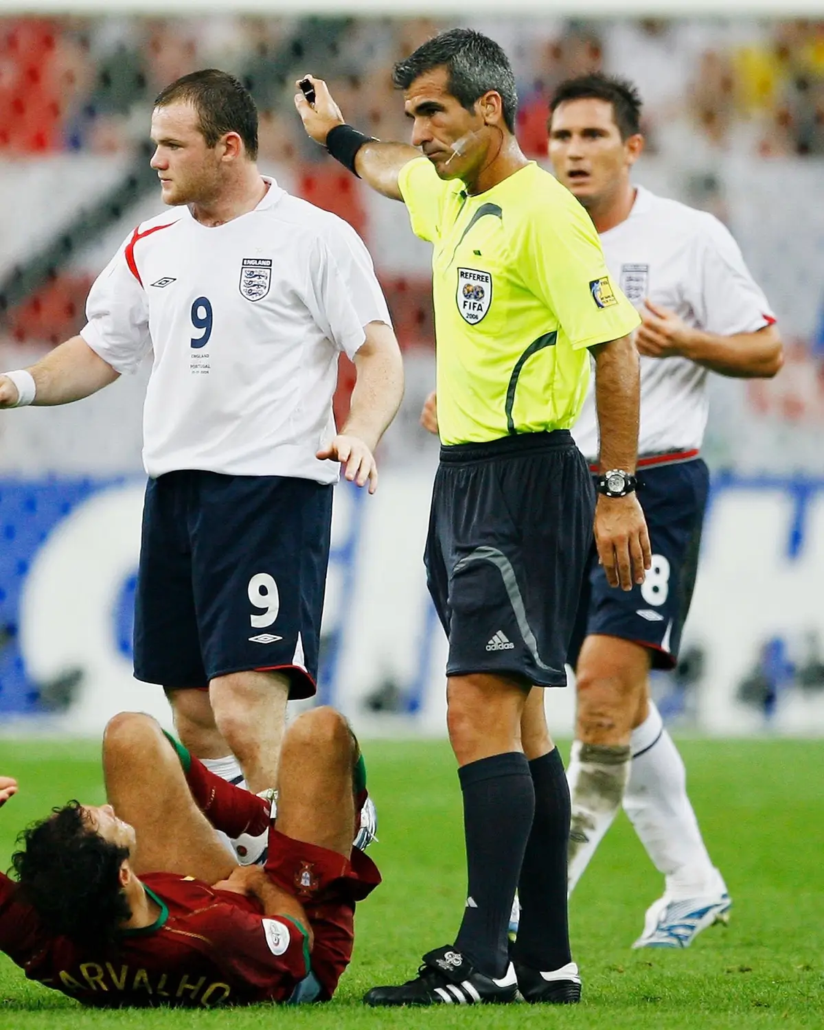 Saturday July 01, 2006 - Cristiano Ronaldo and his Portugal teammates react to a challenge made by 20-year-old Wayne Rooney. The England forward is about to be shown a red card. Ronaldo would go on to score the winning penalty in a shootout that would see England exit the FIFA World Cup. 