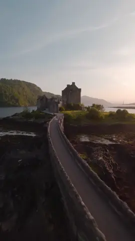 Eilean Donan Castle overlooks the Isle of Skye, at the point where three great sea-lochs meet. Bishop Donan chose the tranquil spot back in 634AD to settle on and create a monastic cell. The first castle was later established in the 13th century by King Alexander II in an effort to help protect the area from Viking incursions. War came to Eilean Donan during the Jacobite Rebellion of 1719. Britain had gone to war with Spain in 1718, and Spain saw a chance to destabilise Britain by inciting another Jacobite Rebellion. In April 1719 a small Spanish force under George Keith, Earl Marishcal landed first on the Isle of Lewis and then at Loch Alsh making Eilean Donan Castle their headquarters. With the support of numerous clans, including Clan Mackenzie and Clan MacGregor, the army proceeded inshore in an attempt to incite more Clans to rally to their cause. However, their absence was timely as on 10 May 1719 a Royal Navy detachment attacked the castle, launching a heavy bombardment that forced the garrison to surrender. Following this, Eilean Donan lay in silent ruin for the best part of two hundred years. The castle we see today was reconstructed as a family home between 1912 and 1932 by Lt Col John MacRae-Gilstrap, and opened to the public in 1955. Eilean Donan has also made several appearances in films including Highlander (1986), James Bond: The World Is Not Enough (1999), and Elizabeth: The Golden Age (2007) to name a few. Video by IG/chrismcintyre__ #Scotland #castle #scottishtiktok #travel #fyp #history #explore #fy 