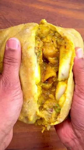 Dhalpuri-Part 3–Trinidad Chicken Roti: A delicious and triumphant amalgamation of traditional, classic favorites—dhalpuri, curry chicken and curry aloo!!!  Top with your favorite spicy condiment including pepper sauce.  Enjoy with a cold drink of your choice! What will it be?  Do you want to learn to make this at home? Estimate cost is $2 USD per chicken roti. Yes so cheap to make it at home!! So if you can’t get to your favorite restaurant, don’t live near one or wish to accept the #trinidadchickenrotichallenge to make this at home—-read below ↘️↘️↘️↘️ Comment 🇹🇹 Chicken Roti below for the full recipes and detailed video. Stop swiping and start typing. 😀✔️🛎️…….You don’t want to miss this opportunity. Tag @cookingwithria when you make it or email pics. Would love to see your creations and hear about how much it cost you to make this at home.  You can do this. I know you can. 💪🏼📈  #dhalpuri #roti #fyp #food #viralreels #westindianfood #westindiantiktok 