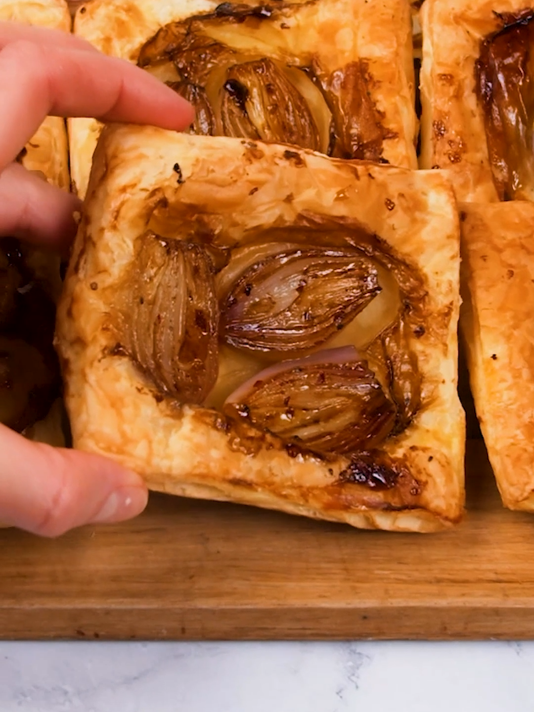 Place all the ingredients upside-down and bake 😍 You'll love the final result 👇 👉INGREDIENTS 1 sheet puff pastry 12-16 shallots, peeled and sliced in half Salt and pepper Chili flakes 60ml (¼ cup) olive oil 45ml (3 tbsp) balsamic glaze Egg wash Parmesan 👉METHOD 1. Preheat the oven to 190°C/375°F. 2. Cover the baking sheet with parchment paper. Pour 8 piles of olive oil on top, drizzle with balsamic, and season with salt, chili, and pepper. Top with onion halves. 3. Cut puff pastry into 8 squares. Cover onions with puff pastry and press the edges with a fork. 4. Brush each tart with egg wash and sprinkle cheese on top. Bake for 20-25 minutes. Will you make them? What other ingredients would you use? ❤️👇 #cookistwow #cookistrecipe #recipes #easy #quick #fun #delicious #cooking #baking #tasty #homemade #foodie #foodlover #foodblog #yummy #foodtok