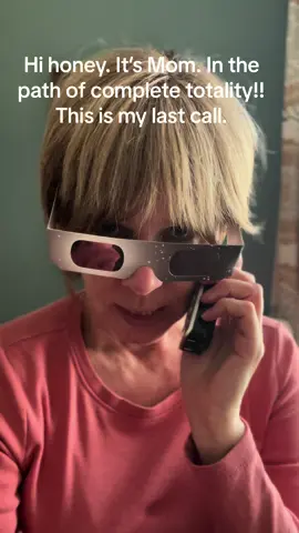 Hi honey. It’s Mom. I will soon be in the path of complete totality. This is your last call. Do not look at the sky. I repeat. #solareclipse #sky #fyp #sun #glasses #blind #funnymomsoftiktok #adultkids #humortiktok #funnyvideos #sons #MomsofTikTok #lollipop 