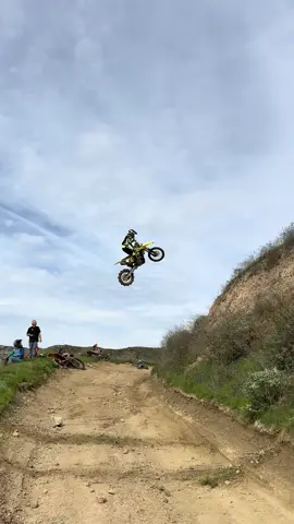 Big road gap 😳✊✊ #fyp #foryoupage #dirtbike #suzuki #rmary #rmz450 #fourstroke #jump #wideopen #sendit 
