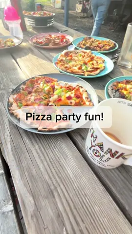 Pizza party fun with homemade tomato sauce, pesto, cowboy candy, carrots and more! #pizza #party #fun #fyp #pizzaoven 