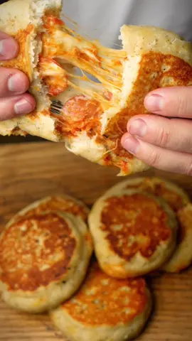 Easy Pizza Pockets These were actually pretty awesome and as for the fillings you can add what ever you desire. I added sun dried black olives and peperoncini piccanti to mine. 🔥🔥🔥 Ingredients  - 3 cups AP flower - 3 tsp baking powder - 2 tsp salt - 1 tbsp Italian seasoning  - 3 cups Greek yogurt  - mozzarella  - Pizza sauce  - Pepperonis  Instructions  Combine your dough ingredients in a bowl. Divide into 8. Flatten each dough ball then stuff with your filling of choice. Form into pockets. Over low heat in a non stick pan gently toss them back and forth until the dough is fully cooked. Be patient this will take about 20 - 30 minutes. If you find the sides are not cooking just place them in the oven until they are cooked through. Enjoy!  #pizza #pizzapocket #pizzalover #EasyRecipe #cheeselover #pepperoni #hotpocket 