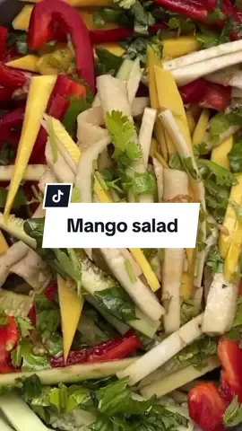 Mango Salad I always enjoy this salad at restaurants but never thought about making it at home. Turns out, it's very easy and quick. The dressing can be made a few days in advance and kept in the fridge. Try it at home and let me know what you think. For the dressing, mix together: - 2 garlic cloves, minced - 2-3 tbsp soy sauce - 1 tbsp honey - Juice of 1 lemon - 1 tsp chili oil or 1 tbsp regular oil For the salad, use your desired amount of: - Mango, peeled and sliced - Cucumber, sliced - Bell pepper, sliced - Turnip, sliced - Cilantro, chopped - Fresh basil, chopped Mix all the veggies and top with the dressing. Don't forget to save this recipe! Enjoy!