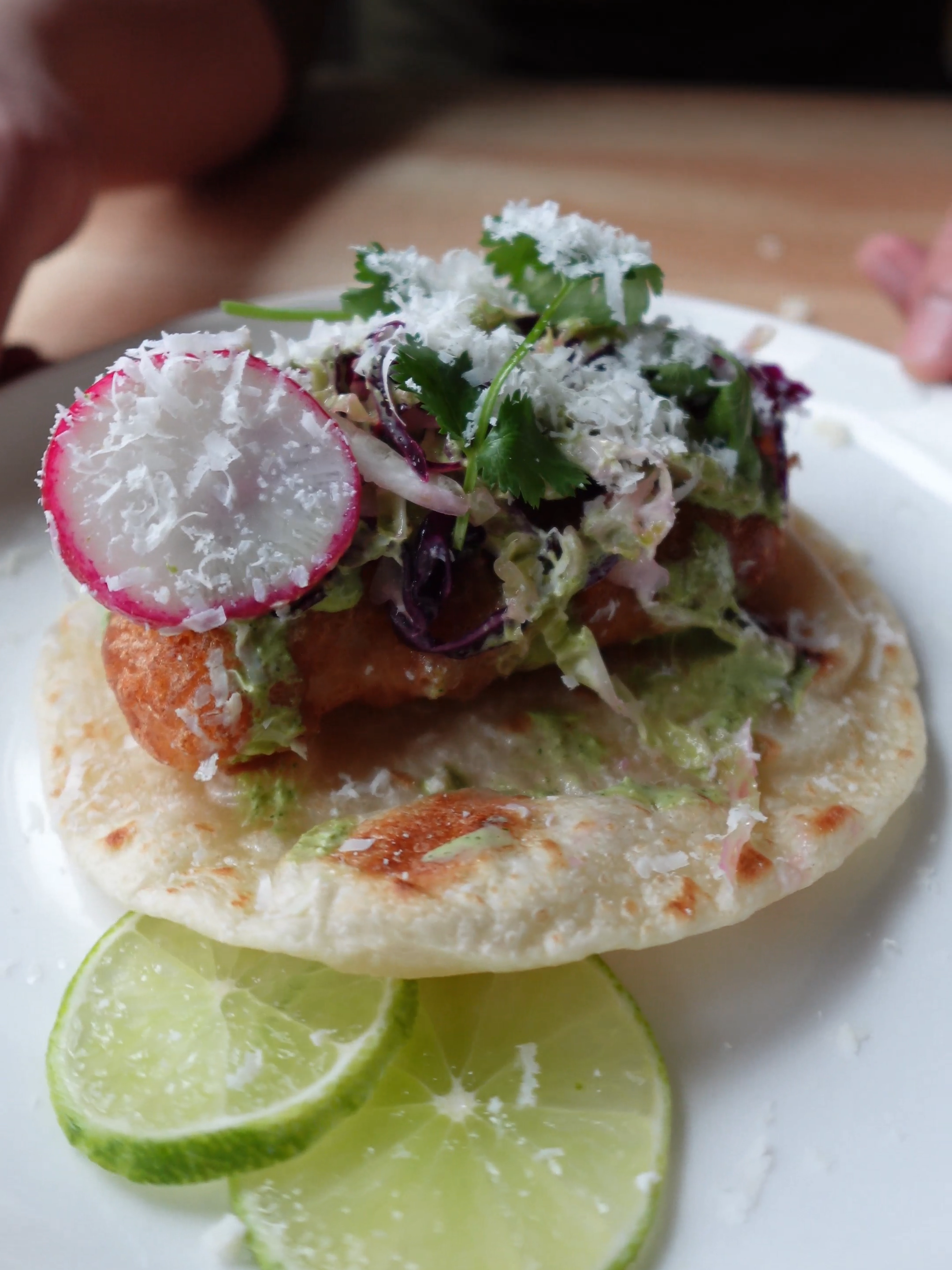 Levi eats Fish Tacos with handmade tortilllas, fried haddock, cabbage slaw, baja sauce, and cotija cheese! #fishtacos #toddlereats #chefdad #cookingvideo