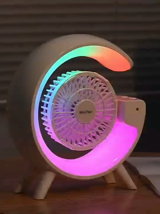 Manufacturer Wholesale--NEW Table Fan Light ，Multifunctional Colorful desktop small fan, portable floor mounted fan with light, USB charging personal fan, air circulation fan, Colorful atmosphere lights, 2000mAh Large capacity battery with remote control，8 types of ambient lighting options，Suitable for home bedrooms, bedside night light fan, and party us 1.RGB LED Light, Create a good atmosphere. 2.Battery back up system 2000mAh. 3.Comes with aromatherapy system. 4. 5 blades for fan. Find cooperation with Wholesalers, Distributors, Importers and Gift Merchants WhatsApp: 86-15818790477 #fan #desktopfan #aircirculationfan