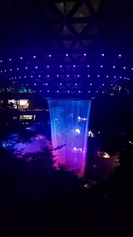 The Rain vortex light show at Jewel Changi Airport, Singapore 🇸🇬 This is the world's tallest indoor waterfall, the light and sound show was so mesmerising 😍 #Singapore #jewelchangi #jewelchangiairport #airport #waterfall #indoorwaterfall #lightshow #aesthetic 