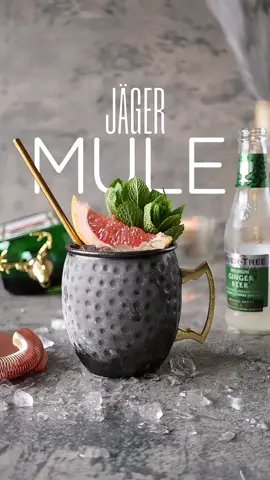 JÄGER MULE Learn how to make this delicious Jäger Mule 🍸. A fantastic combination of spicy, earthy flavour, highlighting the ginger notes of Jägermeister. Recipe: 55 ml Jägermesiter liqueur 25 ml Fresh Lemon juice 35 ml Fresh Grapefruit juice 120 ml Ginger Beer Garnish: Mint sprigs, Grapefruit slice 🥂 CHEERS 🥂 #cocktails #drinks #jäger #jägermeister #moscowmule #Recipe #tiktokvideo #tiktokrecipe #tutorial #drinktok #bartender #bartenderlife #bar #liqueur #ginger #delicious 