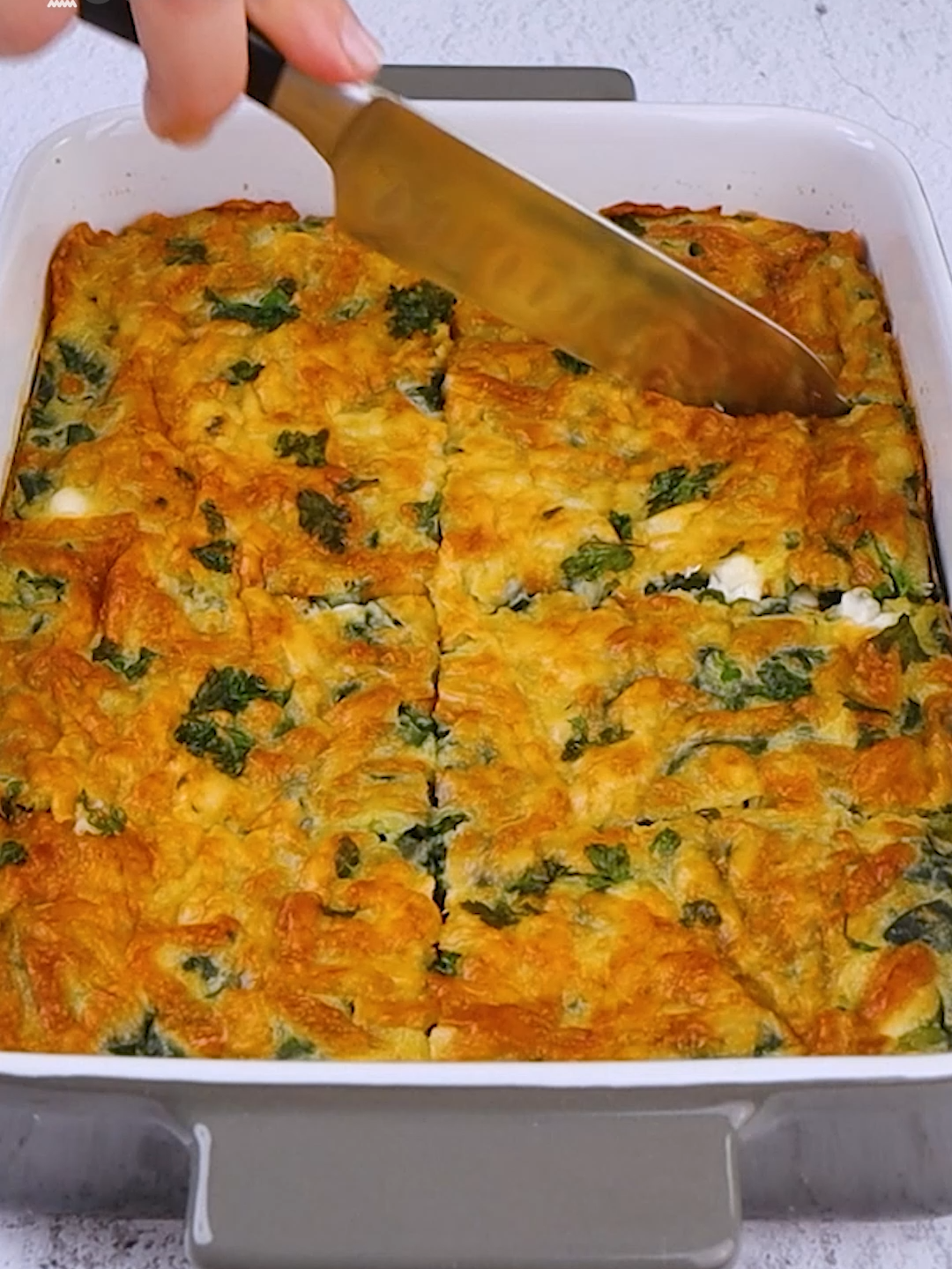 🍃 Spinach + feta ◻️ Delicious meal 🤩 Don't miss the recipe to make a mouthwatering pie that your whole family will adore 😍 👉INGREDIENTS 📌For spinach: Olive oil 1 onion 520g of spinach Salt Pepper 📌For cake mixture: 3 eggs 130ml (1/2 cup) of milk 160g (1 1/4 cups) of flour Salt Pepper Parsley 220g of feta Olive oil Cheese 👉METHOD 1. In a pan add the olive oil and onion and fry until translucent. Add the spinach salt and pepper and fry for a few minutes. Remove from the heat. 2. In a bowl add the eggs, milk, flour, salt, pepper, parsley, feta, and prepared spinach and mix to combine. 3. Add the olive oil to the baking dish and pour the prepared mixture. Arrange cheese and sprinkle with parsley. 4. Bake the cake in the oven at 180°C/360°F for 25 minutes. Cut on squares after baking and serve.  Isn't it delicious? 👇 #cookistwow #cookistrecipe #recipes #easy #quick #fun #delicious #cooking #baking #tasty #homemade #foodie #foodlover #foodblog #yummy #foodtok