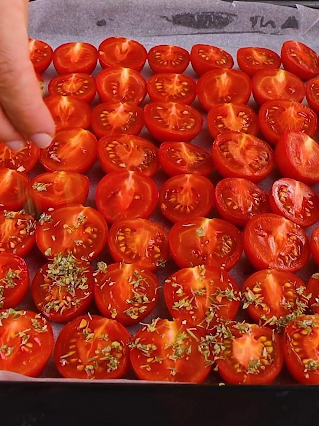 Ready in the oven, light and delicious 😋🍅 They'll be your new favorite side dish!  👉INGREDIENTS Cherry tomatoes Oregano Thyme Salt 2 cloves of garlic 50g (1/4 cup) of sugar Extra virgin olive oil 👉METHOD 1. Wash and cut the cherry tomatoes in half and set aside. 2. In a small bowl add the oregano, thyme, salt, and garlic and mix to combine. 3. Arrange the cherry tomatoes on the baking tray covered with parchment paper and sprinkle with prepared seasoning. 4. Sprinkle cherry tomatoes with sugar and olive oil. Transfer to the oven and bake at 150°C/300°F for 2 hours. 5. Serve confit tomatoes on the serving dish and enjoy. Have you ever tried them before? 😍 #cookistwow #cookistrecipe #recipes #easy #quick #fun #delicious #cooking #baking #tasty #homemade #foodie #foodlover #foodblog #yummy #foodtok