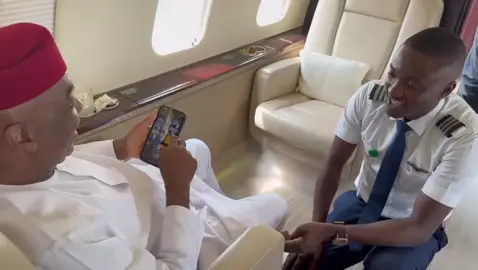 Moment Bishop David Oyedepo on the private airplane blessing his pilot.