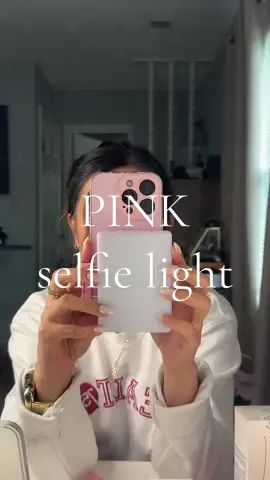If you’re trying to make amazing quality videos, you need a really good portable light. This one is an amazing clip on light with three different light settings, adjustable brightness, and two different attachments to clip on your phone two different ways. Also it’s pink so it’s super easy to charge, and it will change the quality of your videos. Get this pink selfie light right now. #selfielight #ttshop #tiktokshopmothersday #ttsacl #trending #viral #phonelight #fyp 