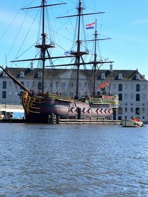Absolutely super cool :) This is a life-sized replica of the VOC ship Amsterdam fully open to public. It's part of The Maritime Museum, so you need to walk through the main building and exit to the dock to get to it. You can climb aboard and walk through all the decks, turn the big rudder wheel, swing in the sleeping hamocks, all sorts of things. It's practically a big playing ground/jungle jim for kids and adults alike. We had the I Amsterdam Card which grants you free access but you have to reserve the date of visit (not precise timeslot, just the day you'd like to visit.  #traveltiktok #amsterdam #travel #travellife #traveler #photography #fy #fyp #viral #viralvideo #viraltiktok #video 