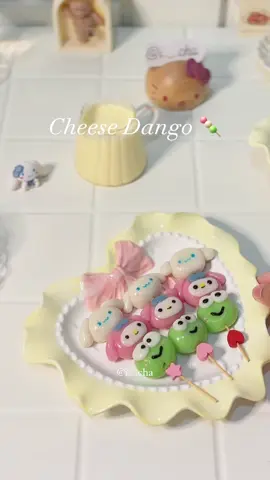 Sanrio Cheese Dango🍡 i loveee dango because of its chewy texture and the creaminess🌝💖 i made the dango to look like this emoji🍡🍡 but cuter with sanrio characters😍 📝ingredients: 75g glutinous rice flour 15g rice flour 2tbsp sugar 70g hot water pink, blue, and green food colouring (pls be careful with the dose, they will have brighter colours when cooked) - 1. divide the dough into 8~10g apiece. shape them into balls and shape them as shown in the video. i don’t have any measurements for the ears, so just use your feeling~ 2. tips: if the dough is a bit dry and hard to shape, add a bit of water 3. put them on the top of the parchment paper 4. boil them until they are cooked (they will float!) 5. take them out and put them inside a bowl with cold water to stop the cooking processes - cheese foam: i use 75g of store-bought cheese foam powder and 150g cold milk. whisk together and pour on the dango — @i._.cha  ❕please do not repost my videos without permission.  #homecafe #homecafé #homecooking #homebaking #homebaker #homebaked #bakeathome #cutefood #dango #sanrio