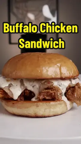 Buffalo Chicken Sandwich Recipe 🥖🌶️ Asking people, If I could cook them one meal, what would it be?! 🤔 Recipe will be on my website later this week! ✍🏽 Fire Escape Chronicles Pt. 64 🧯 #buffalo #chicken #sandwich #Recipe #fried #ranch #sauce #pepper #jack #cheese #breaded #homemade #Brioche #bun 