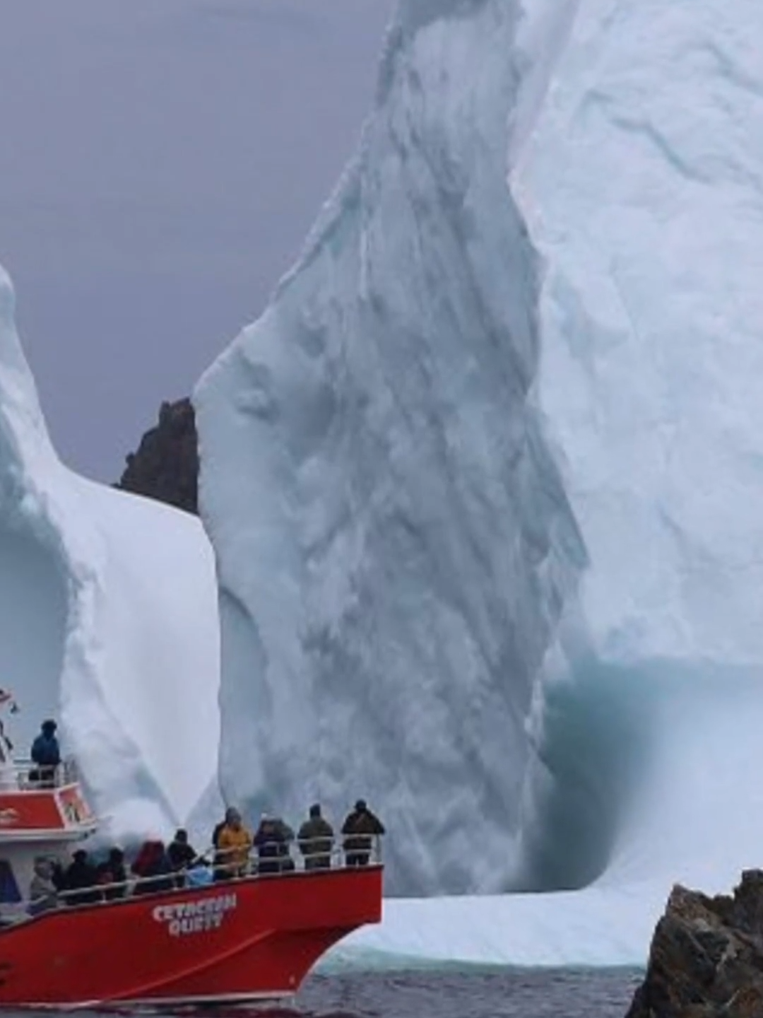 Iceberg flipping over shows how unpredictable they are as tourist season nears. #iceberg #icebergs #weather #shareyourweather #newfoundland #twillingate #fyp #boattour #travel #canada #canadiantravel #canadiannews #weathertok