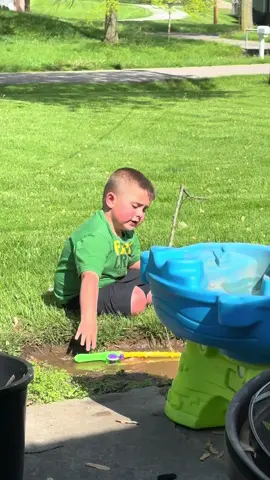 Just a boy who made himself a mud puddle to fish in! He also discovered ge could make a rainbow with the hose! Loving these warm days! #bostonboy #boston #springtime #summervibes #waterishisjam #momlife #tiktokmom #sahm #MomsofTikTok #tweenmom 