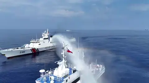 ypPowerful imagery capturing the sovereignty of the Philippines as its ship faces the water cannons of a China Coast Guard vessel near Scarborough Shoal. The resilience and determination of the Filipino crew shine through as the tricolor flag waves proudly. #Philippines #China #ScarboroughShoal #Sovereignty #fyp #foryoupage
