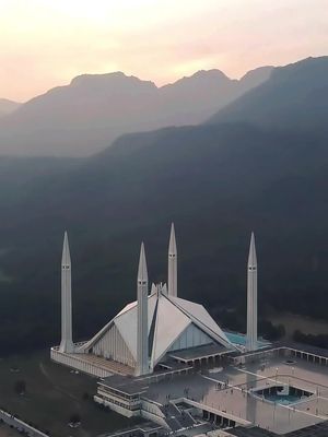 🚁 Experience the breathtaking beauty of Pakistan from a whole new perspective! 🕌✨ Check out this mesmerizing drone shot of the iconic Faisal Mosque in Islamabad! 🇵🇰 #FaisalMosque #Pakistan #TravelPakistan #DroneView #ExploreWithMe #Wanderlust #DiscoverPakistan Immerse yourself in the majestic grandeur of one of the largest mosques in the world, nestled against the backdrop of the Margalla Hills. 🏞️ Whether you're a local or a global explorer, Pakistan's rich cultural heritage and stunning landscapes await your discovery! 🗺️ Don't miss out on the opportunity to witness this architectural marvel from the sky! 🌌 #BucketList #MustVisit #TravelGoals Like, share, and tag your travel buddies to join you on this unforgettable journey through Pakistan's cultural heart! ❤️ Let's spread the beauty of our beloved country far and wide! 🌍 #tiktoktravel #PakistanZindabad #TikTokFamous #ExplorePakistan #TikTokVibes 🎶 Sound on for the full immersive experience! 🎵 #DroneShot #SoundOn #FaisalMosqueViews