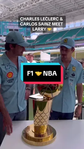 #CharlesLeclerc and #CarlosSainz meet @The Larry O’Brien Trophy at the #F1 Miami Grand Prix! 🏆 #Formula1 #NBA #Racing 
