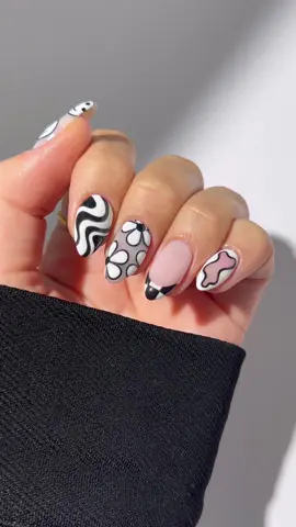 a fun and cutesy b&w mix and match 🎱🕊️🎶🎧🗝️ • liner brush from @wanderGEL official - code NAILOLOGIST10 for 10% off • base is purebuild in shade ‘kiss’ from @HONA  • black and white art gel from @Nailchemy (if you’re looking for a highly pigmented black or white art gel I highly recommend these)  • glass top coat from @VARNAIL ish • ‘f off’ ring from @Westwood and Hyde  • black ring from @SuryaChamak - code NAILOLOGIST20 for 20% off • white ring from @Monica Vinader - code NAILOLOGISTMV20 for 20% off #nails #nailinspo #mixandmatch #bandw #summernails #springnails #naildesign #nailart #blacknails #nailtutorial 