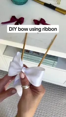 DIY bow using ribbon. Cut the tails and away you go. I hope it helps xx #diycraft #gifted #bow 