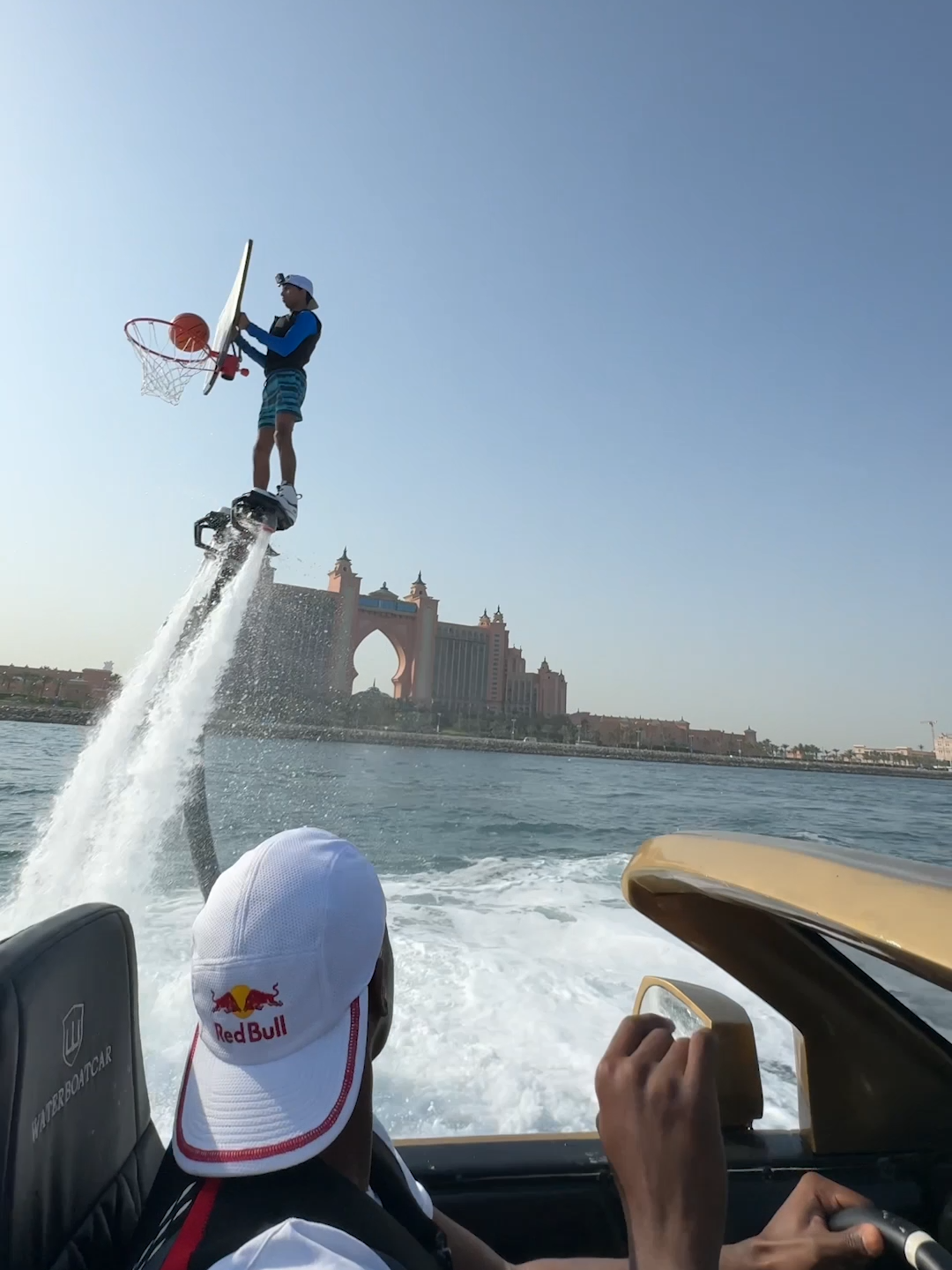 let's talk about that car for a second 😅 🏀: @lethalshooter #redbull #givesyouwiiings #basketball #hoops #dubai #trickshot