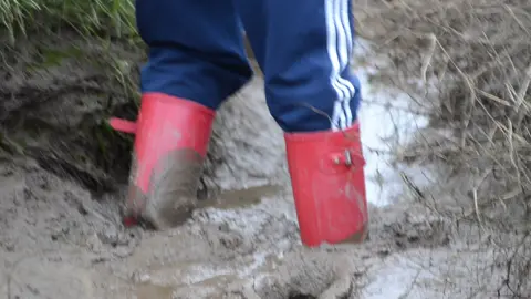 Me getting stuck in the estuary mud in my red hunter wellies #mud #muddy #muddywellies #hunters #stuckinthemud 
