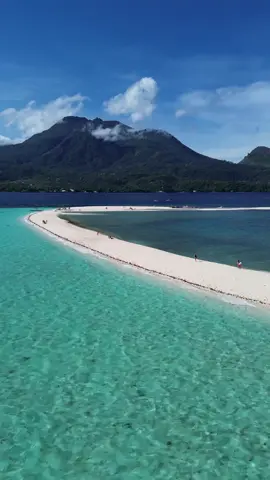 Camiguin White Island is a stunning white sandbar with the picturesque Mt. Hibok-Hibok and Old Vulcan as its backdrop.  #travel #camiguinisland #islandbornoffire #summervibes #philippines #whiteisland 