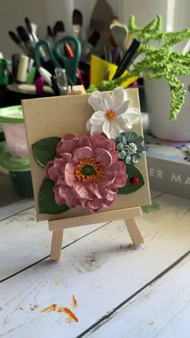 These little ladybugs are usually hidden on the back of my artwork, but sometimes they find their way to the front and become the stars. This was a custom mini bloom on a 4” x 4” canvas with its own display easel. My typical mini blooms are a bit smaller, but I love how this size gave me the space to highlight one of my larger flowers. #foryou #flowers #floralart #texturedpainting #thickpaint 