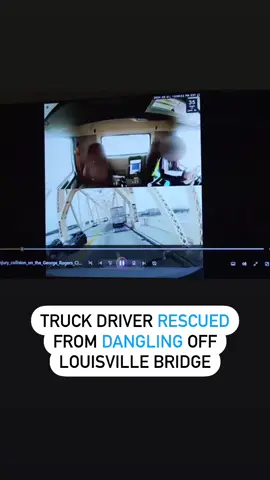 A driver swerved into a semi, leaving a truck driver dangling from a Louisville bridge. Video shows the dramatic rescue. #news  #fyp #kentucky #louisville #dashcam