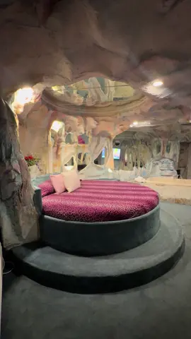 Full pan of the Ice Cave Room. I love all the hints of pink! #CouplesHotel #VintageHotel #ThemedRooms #Kitschy #KitschyHotel #IceCaveRoom 