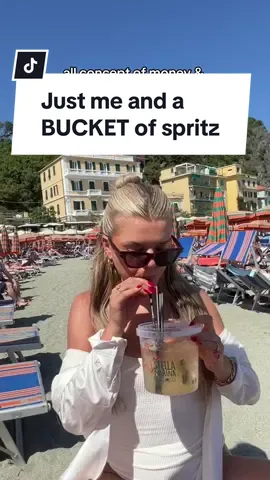 just a girl and her BUCKET of spritz #cinqueterre #florenceitalytravel #daytripsfromflorence #italydaytrips #monterossocinqueterre #travelcontentcreator #travelcreator #italytravel #digitalnomad 