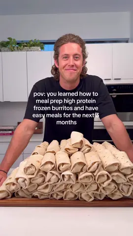 High Protein Frozen Burritos are the Ultimate Meal Prep Meal prepping and freezing high protein burritos changed the game for me - and was actually the first “meal prep” content I ever made I had honestly never meal prepped until I realized just how convenient having easy, high protein meals stocked in my freezer was. It made my life SO MUCH easier on days I didn’t feel like cooking Since I started posting frozen burrito recipes, I’ve received thousands of DMs showing your freezers stocked with 10, 20, 30 and even 100+ of my high protein burritos at a time If you’re looking to enter the burrito meal prep game, here are my top tips👇 Freeze Your Burritos - Storing frozen keeps burritos tasting their best, and allows them to last for months. It allows you to prep in huge bulk (think 20-30 burritos/meals at at time) without worrying about them going bad/going uneaten - Wrap individually and freeze, or place burritos on a sheet pan and toss in the freezer uncovered (“flash freeze”) and then add to a gallon sized bag. Flash freezing first keeps them from sticking together while freezing Reheat Method  - Remove your burrito straight from the freezer, wrap in a paper towel, microwave for 1.5-2 minutes to thaw (flip halfway) - the goal is to get the interior softened but not hot. Next, air fry (I usually do 375 degrees for 6-7 minutes), or pan fry until crispy. Your burritos will come out perfectly crisp (not soggy) and taste as good, if not better, than fresh Slowly Stockpile - You don’t need to spend hours and hours prepping - start by making 1-2 of my recipes a week (which will usually yield 20-30 burritos/meals). Repeat weekly, rotating recipes based on preference, and you’ll slowly build a huge stockpile of frozen meals. The concept is to be in a “meal prep surplus” - cooking more than you eat each week, until you eventually have enough meals to last for months Make a Low Calorie Side Sauce - I like to make simple, high protein yogurt sauces as a pairing. Low fat greek yogurt (and Skyr) taste nearly identical to sour cream - and can also add an additional 10+ grams of protein to your meal for minimal calories. Try mixing plain yogurt or Skyr with your favorite hot sauce for a delicious dipping sauce. If you’re hesitant, start with full-fat greek yogurt (5%) which still has a great protein-to-calorie ratio and tastes incredible Cool the Filling Before Rolling - When I prep burritos in bulk, I tend to just mix everything together to create a “filling” instead of adding each ingredient separately. After creating the filling, I like to place it in the fridge/freezer for 15-20 minutes so it can thicken - and it makes rolling burritos perfectly completely effortless If you’re looking for recipe ideas - I have an entire chapter in my meal prep cookbook dedicated to high protein frozen burrito preps, and tons of recipes on my feed  #stealthhealth #highprotein #macrofriendly #mealprep #burritomealprep #frozenburrito #proteinburrito #macrofriendlyrecipe 