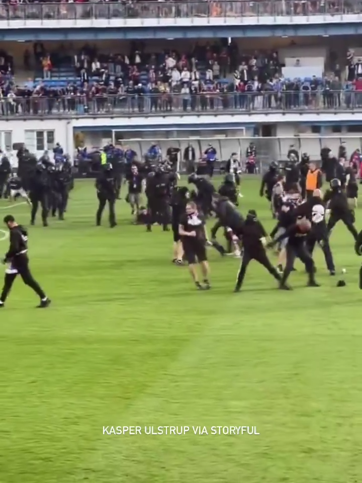 The Czech football association launched an investigation after the Czech Cup final was marred by violence between Sparta Prague and Viktoria Plzen supporters on Wednesday, May 22.   Dozens of supporters from both camps ran onto the pitch at full-time with riot police called in to separate the fans, reports said. The brawl also disrupted a live television broadcast after one presenter was hit by a plastic chair. #news