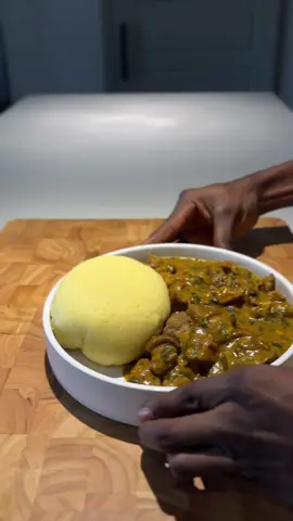 OGBONO SOUP💥❗️ Asa m said she was craving some authentic Igbo food, so I sent her a PJ 🛩️ to come for a mini vacation 😇 then prepared one of her favorite meals (Ogbono Soup)🔥. As a man, you suppose dey pamper your Asa make another man no go dey buy pampers for her matter o (IYKYK)😂. Full recipe is on my website. Link in my bio 🔗  #explore #explorepage #fyp #ogbonosoup #igboamaka #naijafood #igbo 