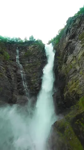 Norway is UNREAL! Wait for it!🤯🤯  #waterfall #norway #nature #fpv #drone 