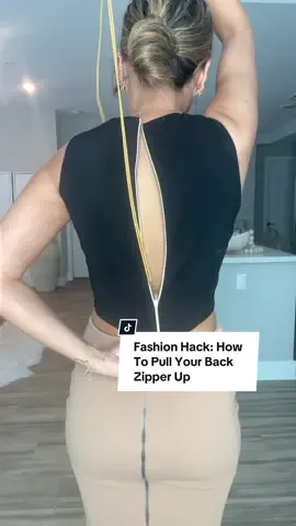Fashion Hack: How To Pull Your Back Zipper Up 💫 #fashionhacks #fyp #styletok  Here’s how to pull your back zipper up when you can’t reach it, or don’t have anyone to help you zip it up ✨ p.s I didn’t show the pin coming off in the edit, but it’s easily removed.  The zipper is now behind your neck and it’s like removing a necklace yourself xo Today’s affirmation: “I will not compare myself to strangers on the internet” 🤍 Memo: the pull tab on this specific zipper is much larger and can fit the string or shoe lace right through.  For all other zippers with smaller holes (which is most of my other zippers), this hack is amazing! You can also use a shoe lace & paper clip for this hack as well.  If you’re not used to closing safety pins or have trouble closing them, use a paper clip — also a great alternative.  When using a paper clip, open it up to a full S shape and hook one end into the opening of the zipper, and the other bend the opening to close it and out the lace through it!  You can also use a hanger as well, but the hanger doesn’t always fit into the zipper hole.  Some are smaller and that’s why a safety pin or paper clip work best! I’ve been doing this hack for as long as I can remember, and it’s a game changer if you live alone and don’t have anyone to help you with your back zipper lol!💫🤍 TAG someone who would love this, & don’t forget to save it to refer back to when styling 💫 #style #fashion #OOTD #todayslook #outfitideas #grwm #styletips #fashionhack #outfitinspo #outfitideas #foryourpage #fashiontiktok 