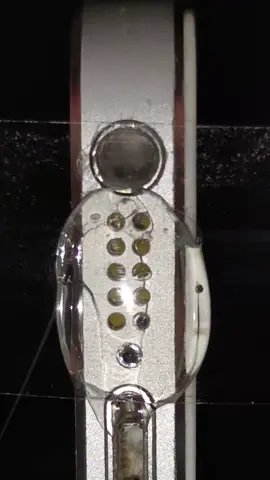 Cleaning iPhone speaker with hot glue 
