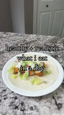Healthy but realistic what I eat in a day, down 30 lbs!  Breakfast: Eggs, diced potato, avocado, EBTB seasoning Lunch: Just bare chicken on carb balance wrap with lettuce & bolthouse ranch, string cheese, watermelon Snack: Built puff bar Dinner: Smoked salmon flatbread (3 pieces) with salad and poppi mocktail  #whatieatianday #whatieatinadayrealistic #whatieatinday #wieiad #wieiadrealistic #fulldayofeating #fdoe #fulldayofeats #whatieat #whatieataday 