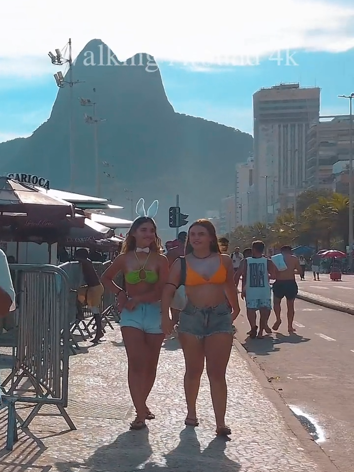 🌴Beach Walk in Rio de Janeiro, Brazil. Leblon Beach is an extension of Ipanema beach that is made up of luxurious and modern buildings. It has beautiful views, both of Morro Dois Irmãos, Ipanema Beach and Pedra do Arpoador further away. In addition to being a beautiful beach for swimming, it is a great option for practicing sports such as: running, volleyball and beach soccer, among others. At the end of the beach there is also a viewpoint from where you can see the entire coastline of Ipanema and Leblon. It's a quiet region, with kiosks and lots of people playing sports. We noticed that it is beautiful to see elegant fashion on the beaches, women with elegant bikinis, lots of inspiration for beach looks, trendy bikinis, a summer style and lots of natural beauty on the beach, healthy lifestyle, beach activities and joy of Summer is what we will see in this video, and we can see what the movement was like on the beach that day, with lots of beautiful people cooling off by swimming in the sea and lying on their sarongs getting a tan in their swimwear. Brazilians prefer bikinis and swimsuits to sunbathe and get the famous mark, the thong bikini is the most used on Brazilian beaches. In Brazil, it is very common for women to wear bathing suits and bikinis to enjoy the sun even more, as they have numerous benefits such as the absorption of vitamin D in the skin, the stimulation of melanin, the increase in libido, among others, natural or artificial tanning ends up being a decisive factor in influencing your self-esteem and providing well-being. #beach#brasil#Summer#riodejanerio#foryou#leblon#ipanema#rio#carioca#girls#beauty#playa#verano#funny#summervibes#mujeres#brazilbeach#bikini#best#walk#4k#turismo#carnaval#travel#happy#sea#mar#sunset#sun#sports#surf#party#paradise#music#life#vibes#vacation#beachlife#litoral#chicas#vacaciones#place#cool#nature#tour#coast#sand#amazing#beautiful#hot#praia#good#follow#fashion#explore#holiday#sunny#city#weekend#praiasbrasileiras#style#walkingbeach#braziliangirls#travellife#trip#praiasdobrasil#Strand#Frau