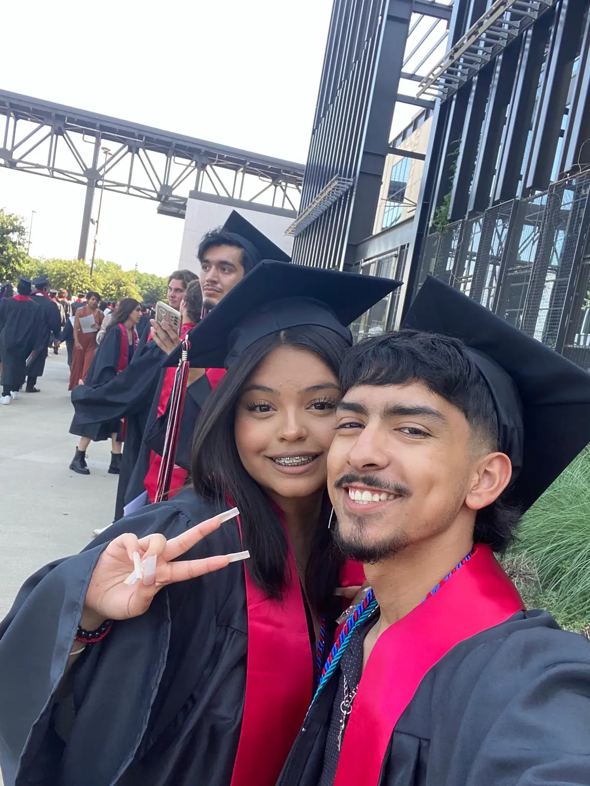 just like prom, we graduated a year ago. we hit a big milestone together forever grateful for being able to graduate with my best friend. @nnbs.carlosss 🤍