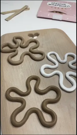 how to make squiggly coasters ❤️‍🔥 using a long coil, here’s an easy and simple clay diy to elevate your coaster game 👏  made by @Chelsea Morgan Art our pottery wizard ✨  #clay #pottery #athomepottery #clayart #diycoasters #diyclaycrafts #diyclayinspo #potteryinspo #diycraftinspo #crockd 
