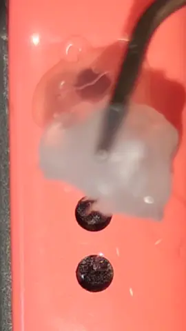 Cleaning iPhone speaker with hot glue 