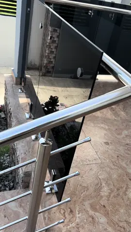 A touch of modern look. A blend of tempered laminated dark glass and 304 stainless steel. Prime Glass is a complete glass and stainless steel assemblers in Ghana. We pay attention to every single detail to make sure the installation is top notch. Looking to install glass railings in your home?  Contact us for more info! 📲 0535241993  We provide free quotation with up to 30% installation fee discount. #foryou #glass #stairs #balcony #glassinstallers #primeglassghana #glasscontractor #glassinstallers #aluminumwindows #glassdoors #stainlesssteel #explore #renovation #houserenovation #ghana #viral 