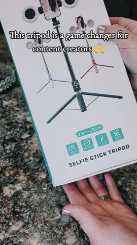 Content creators are leveling up with these remote tripods ✨️ #shopwithme #momcontent #MomsofTikTok #momtok #content #contentcreator #influencer #tripod #fypage 