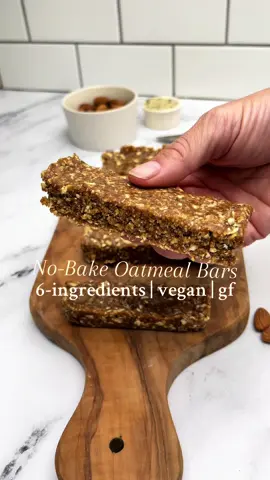 No-Bake Oatmeal Bars for the perfect lil snack or sweet treat.  1 cup (225 g) packed, pitted soft dates 1/2 cup (75 g) almonds 3/4 cup (75 g) oats 1/4 cup (40 g) hemp seeds 1/4 cup (70 g) natural peanut butter (or other nut or seed butter) 1 tbsp (15 mL) maple syrup pinch of salt, optional Place the almonds and dates in a food processor or high-powered blender and mix until it forms a crumbly dough. Add the oats, hemp seeds, peanut butter and maple syrup and process until it forms a thick dough you can squeeze into a small ball. Line a standard-sized loaf pan with parchment paper then firmly press the dough into the pan. Spend a few minutes pressing it in to the corners and flattening the surface. Place in the freezer for about 1 hour to firm. Use the parchment paper to lift the bars out of the pan then cut into 8 squares or 6 bars and store in the fridge in an air-tight container. #plantbasedrecipes #nobakerecipe #easysnackideas #easysnackrecipes #foodtiktok 