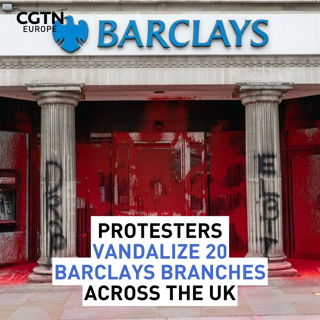 Barclays bank branches across the UK have been vandalized by protest groups Palestine Action and Shut the System. Up to 20 buildings across England and Scotland have been targeted, with branches being covered in red paint and windows smashed. A spokesperson for Barclays said: ‘While we support the right to protest, we ask that campaigners do so in a way which respects our customers, colleagues and property.’ The two groups have said that target action will continue until Barclays stops investing in certain companies. ##palestine #protest #barclays #UK #crime  📸Palestine Action