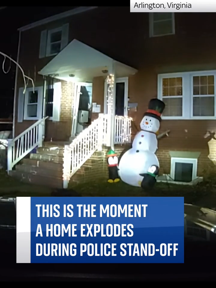 New footage has emerged showing the dramatic moment a house in Arlington, Virginia, exploded during a police stand-off, killing the occupant.⁠ ⁠ Police were called to the address in December over reports a flare gun had been fired. They said the explosion was likely caused by homeowner James Yoo, 56, who died in the blast.⁠ ⁠ #Arlington #Virginia #Police #Explosion #StandOff